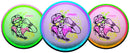 Axiom Particle Glow Soft Proton Hex midrange disc, 2026 OTB Open "Vibes" stamp, multi color disc with multi color rim