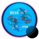Axiom Particle Glow Soft Proton Proxy putt & approach disc, Silva Saarinen 2025 Team Series "Forest Stars" stamp, blue disc with pink rim