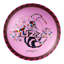 Discraft FuZed Buzzz midrange disc, Buzzz Saw stamp, magenta disc with black and magenta rim