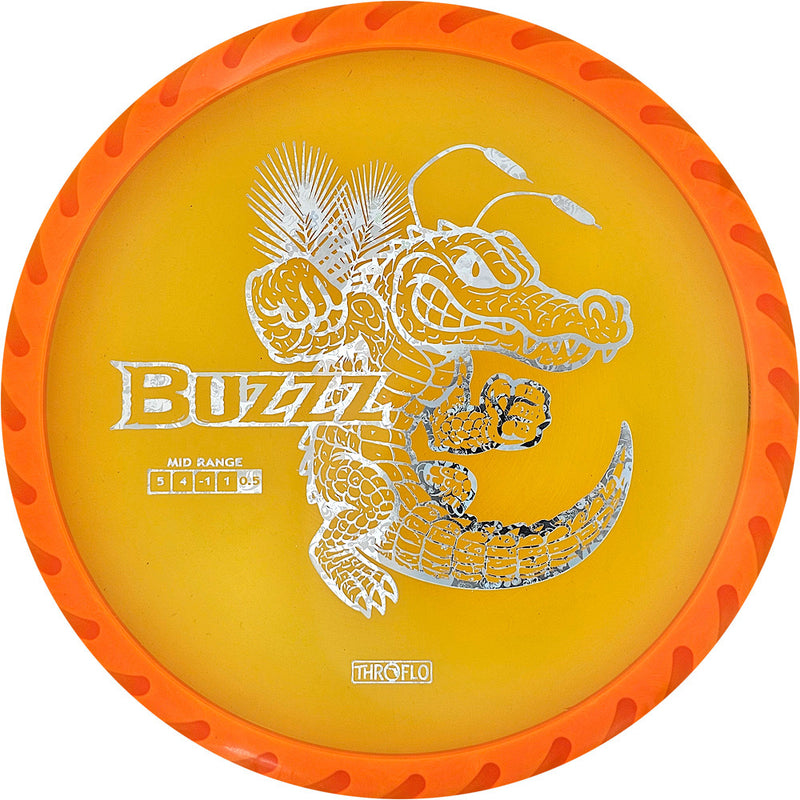 Discraft FuZed Buzzz midrange disc, ThroFlo “Gator Buzzz” stamp, orange disc with white rim