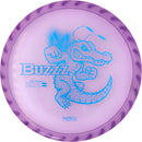 Discraft FuZed Buzzz midrange disc, ThroFlo “Gator Buzzz” stamp, purple disc with white rim