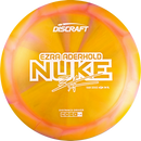 Discraft Z Swirl Nuke driver disc, Ezra Aderhold 2025 Tour Series stamp, orange and pink disc