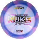 Discraft Z Swirl Nuke driver disc, Ezra Aderhold 2025 Tour Series stamp, purple and blue disc