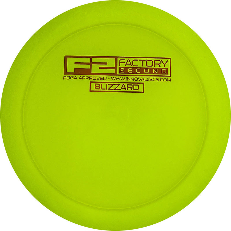 Innova Blizzard Champion Boss driver disc, F2 Factory Second Bar Stamp stamp, yellow disc