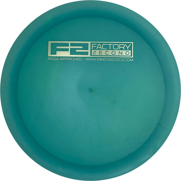 Innova Blizzard Champion Destroyer driver disc, F2 Factory Second Bar Stamp stamp, turquoise disc