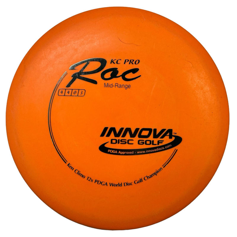 Innova KC Pro Roc midrange disc, Ken Climo 12x World Champion stamp, orange disc