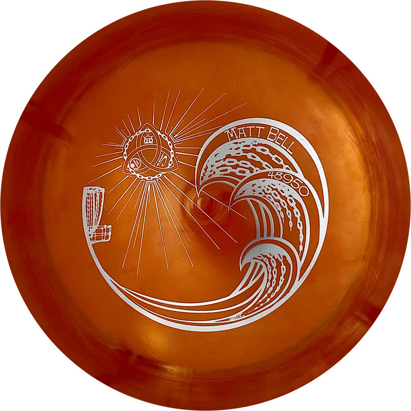 Latitude 64 Opto Knight driver disc, Matt Bell Trilogy Tour Stamp Chain Waves stamp, dark red disc