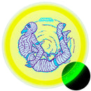 MVP Particle Glow Proton James Conrad Trail driver disc, James Conrad 2026 Halloween Team Series stamp, yellow disc with glow rim