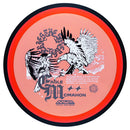 MVP Proton Resistor fairway driver disc, Eagle McMahon Synergy Series "Harmony Through Opposition" stamp, orange disc